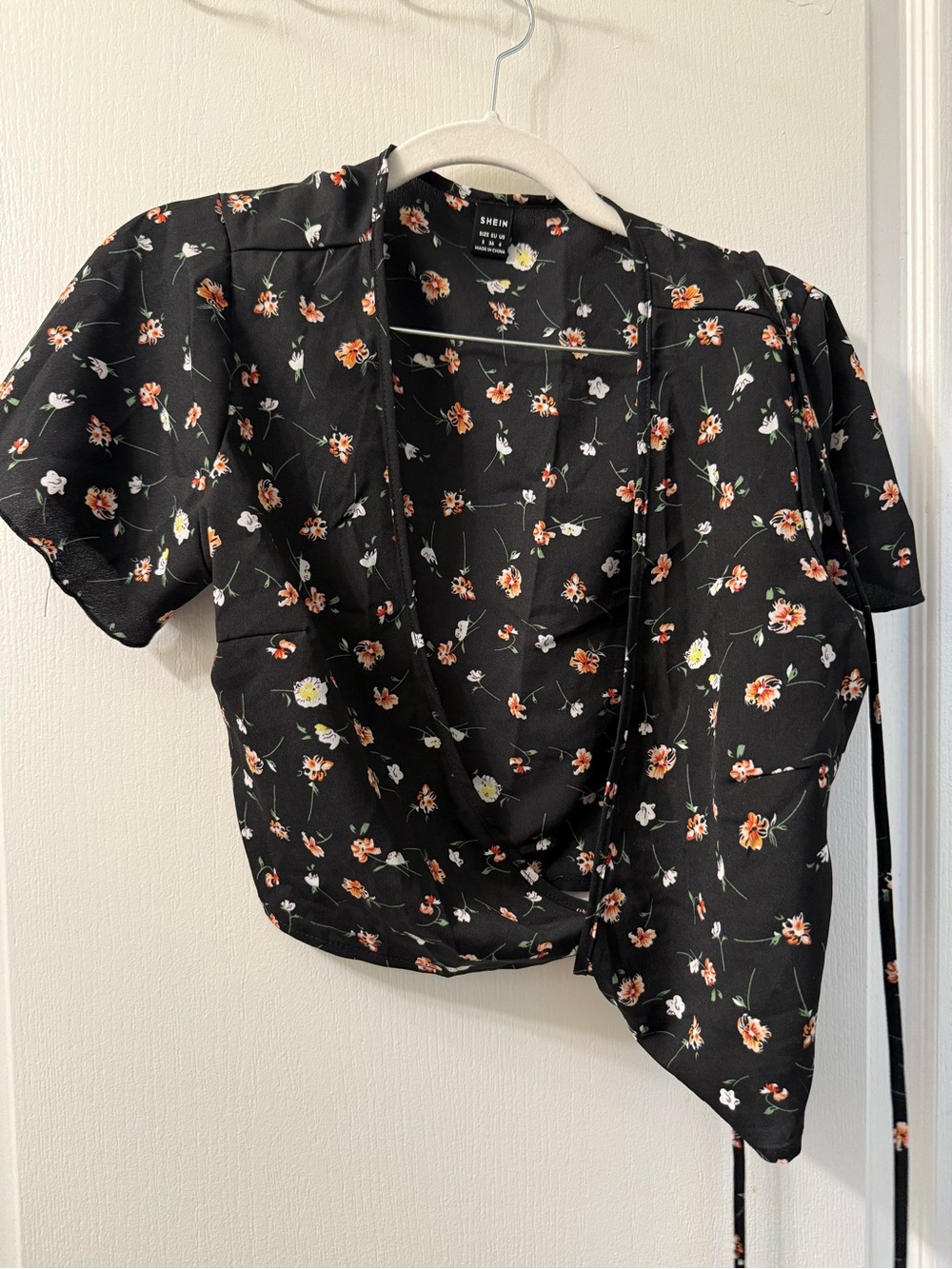 SHEIN Black Floral Wrap Crop Top with Orange & White Blooms